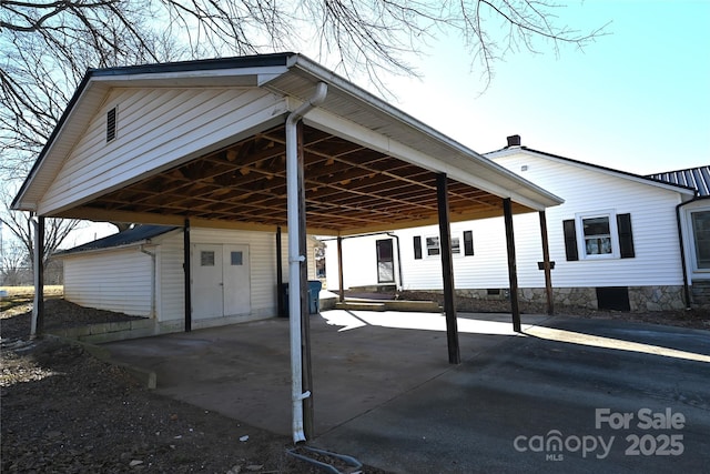 view of parking featuring a carport