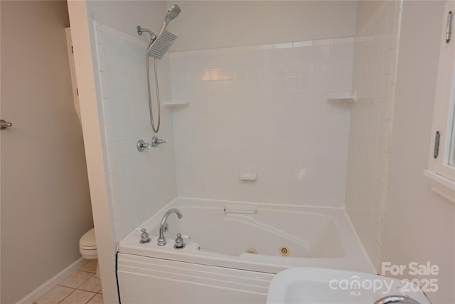 bathroom with tile patterned flooring, separate shower and tub, and toilet