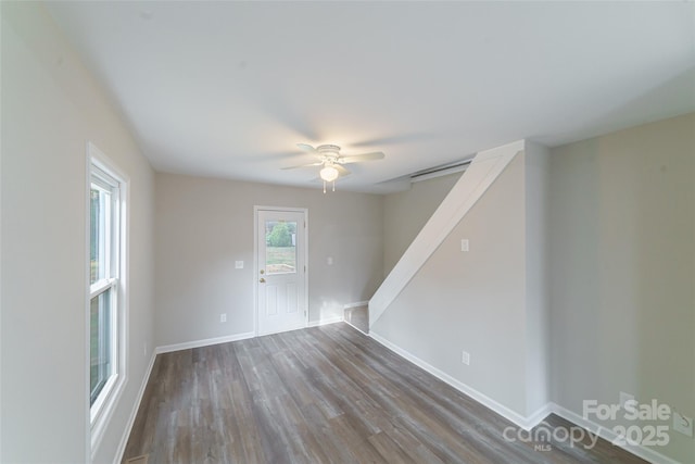 spare room with ceiling fan and hardwood / wood-style floors