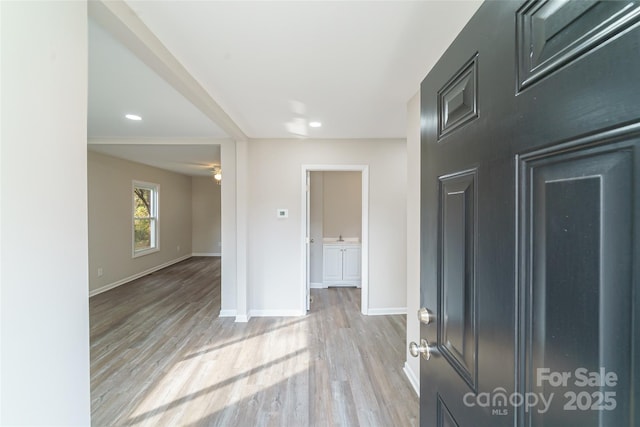 corridor featuring light hardwood / wood-style floors