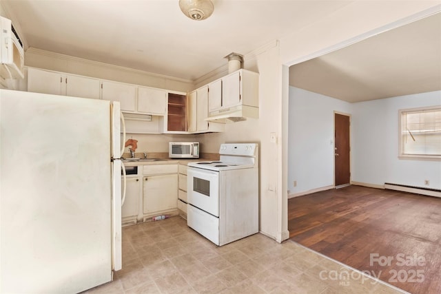 kitchen featuring white appliances, sink, and a baseboard heating unit