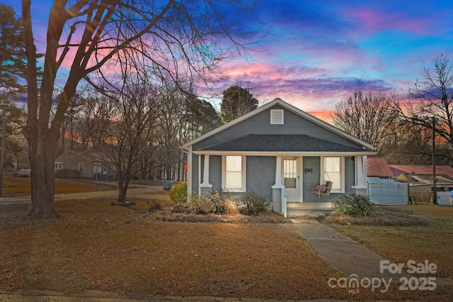 bungalow-style home featuring covered porch