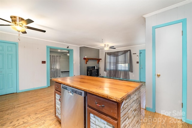 kitchen with stainless steel dishwasher and ornamental molding