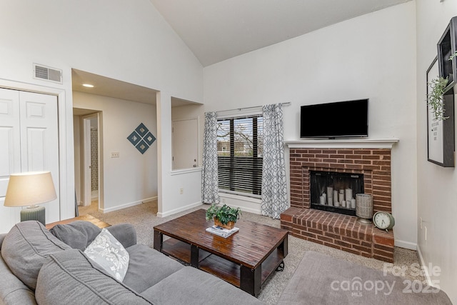 living room featuring high vaulted ceiling, visible vents, a fireplace, and baseboards