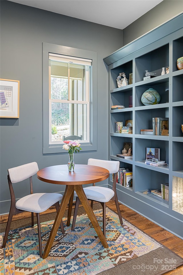 living area featuring hardwood / wood-style floors