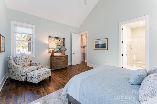 bedroom with ensuite bath, high vaulted ceiling, and dark hardwood / wood-style floors