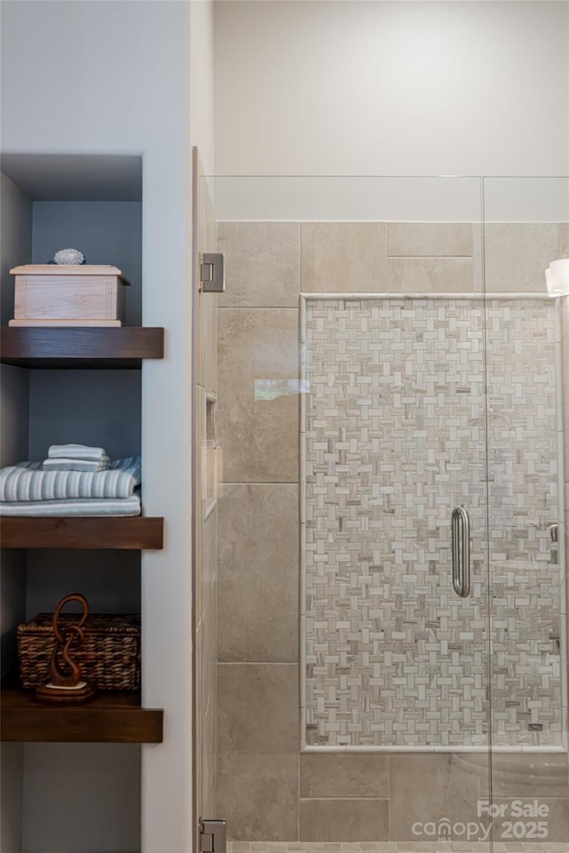 bathroom with an enclosed shower