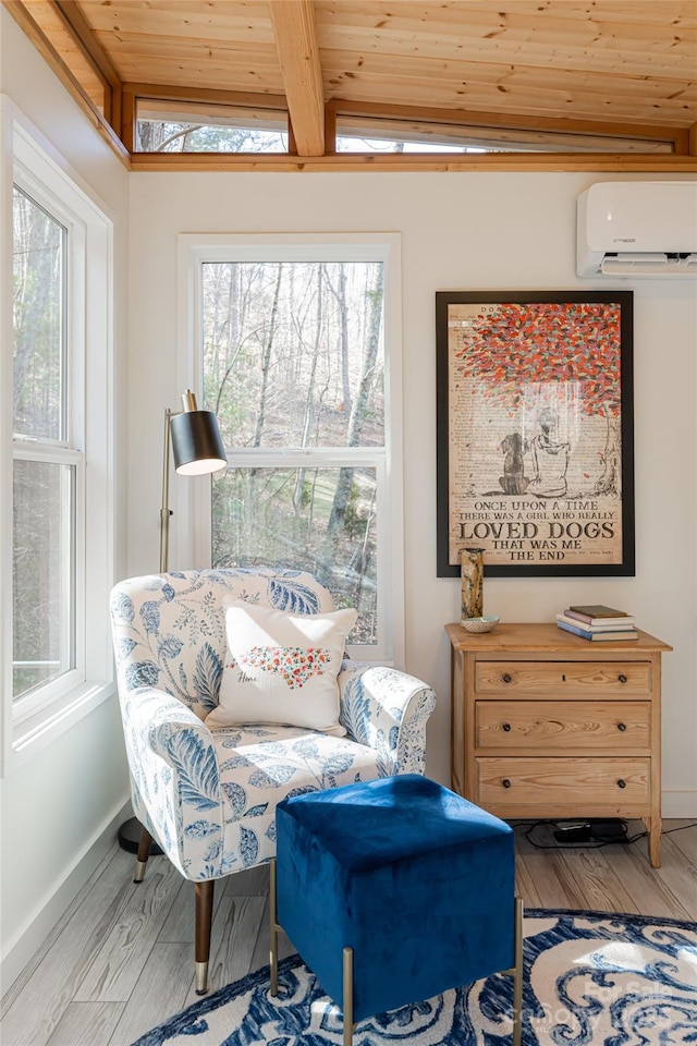 living area with wood ceiling, a wall mounted air conditioner, light hardwood / wood-style floors, and lofted ceiling with beams