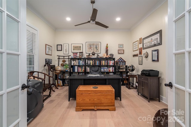 home office with french doors, light hardwood / wood-style floors, ceiling fan, and crown molding