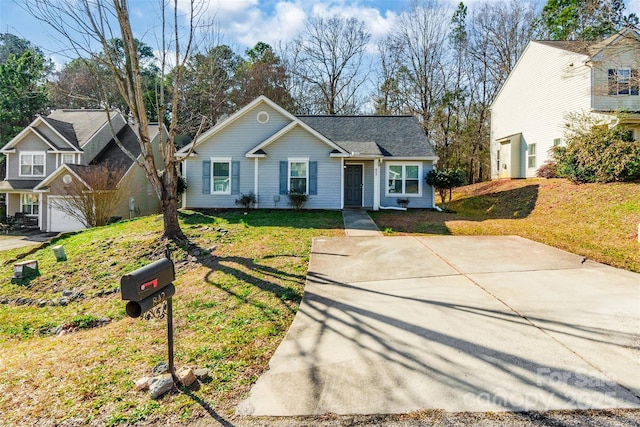 ranch-style house with a front lawn and a garage