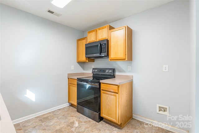 kitchen with black / electric stove