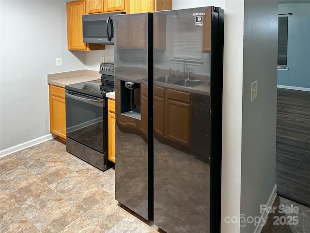 kitchen with black / electric stove