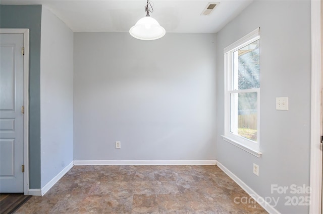 spare room with a wealth of natural light