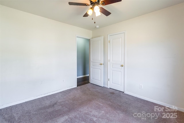 unfurnished bedroom with carpet flooring and ceiling fan