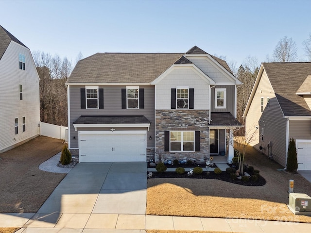 front of property with a garage