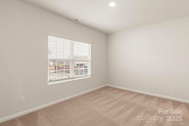 empty room with carpet floors