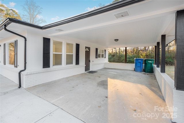 view of patio with a carport