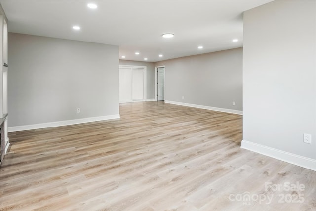 unfurnished living room featuring light hardwood / wood-style flooring