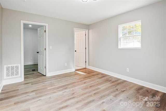 unfurnished bedroom featuring light hardwood / wood-style flooring