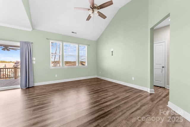 unfurnished living room with hardwood / wood-style flooring, plenty of natural light, and vaulted ceiling