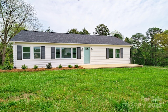 ranch-style house with a front yard