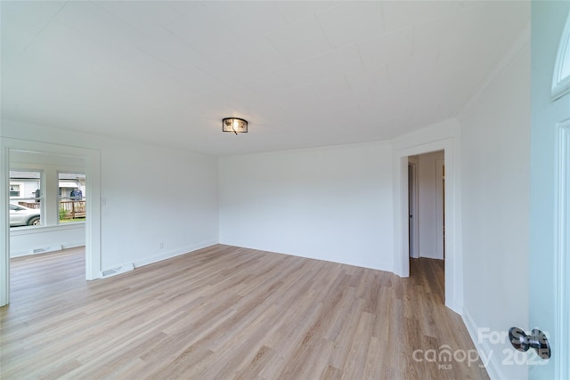 empty room featuring light wood-type flooring