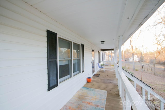 wooden deck featuring covered porch