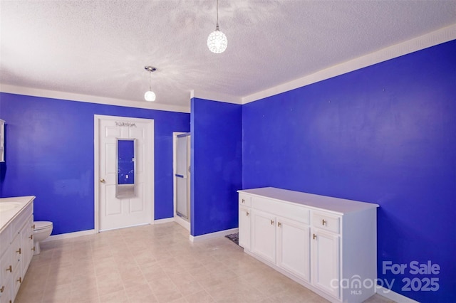 unfurnished bedroom with a textured ceiling