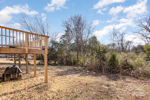 view of yard featuring a deck