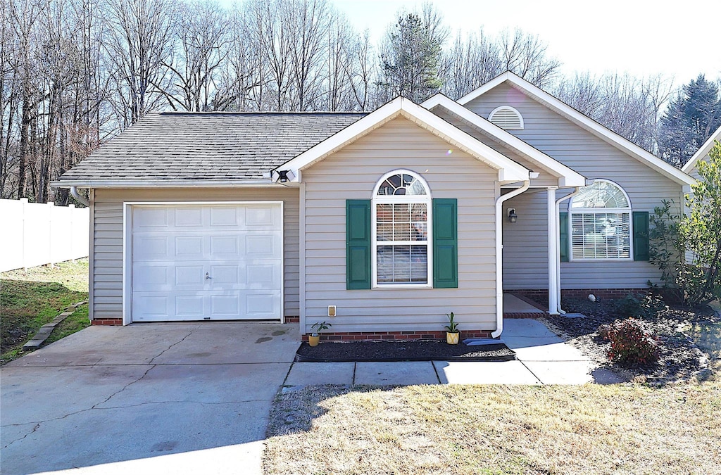 ranch-style house with a garage