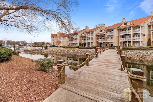 dock area featuring a water view