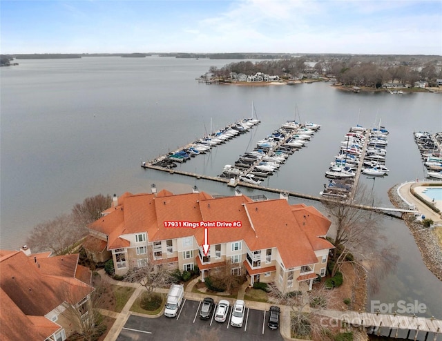 birds eye view of property featuring a water view