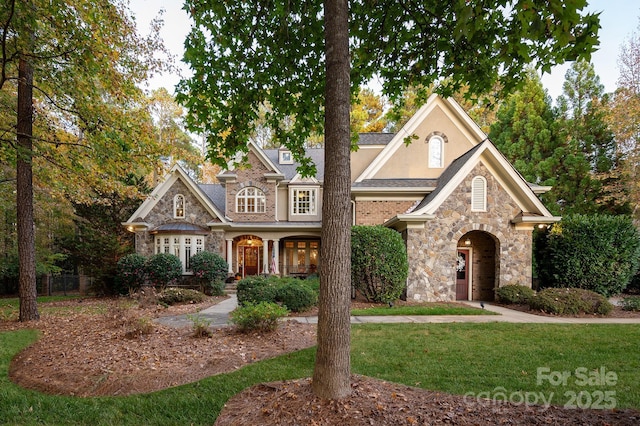 view of front of home with a front yard