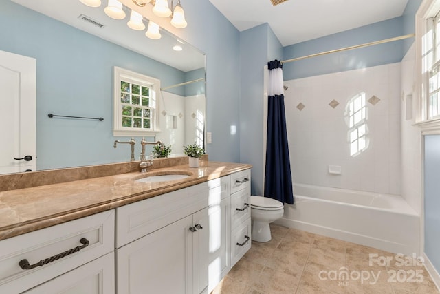 full bathroom with vanity, toilet, tile patterned floors, and shower / bathtub combination with curtain