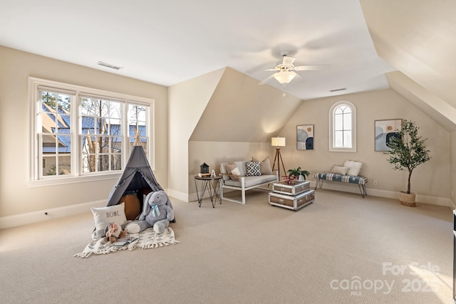 rec room featuring ceiling fan, carpet, and lofted ceiling