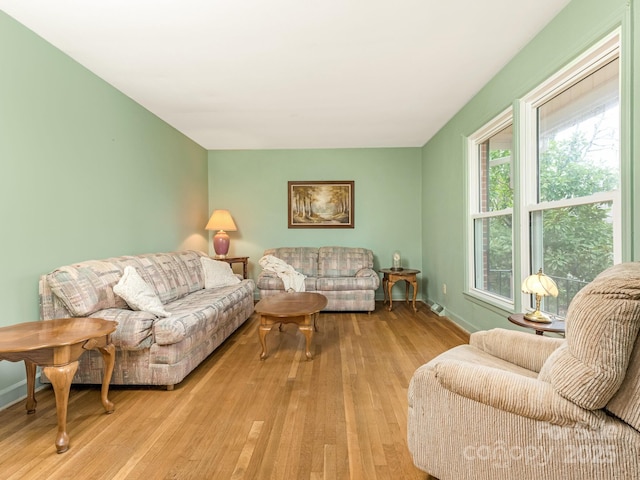 living room with light hardwood / wood-style floors