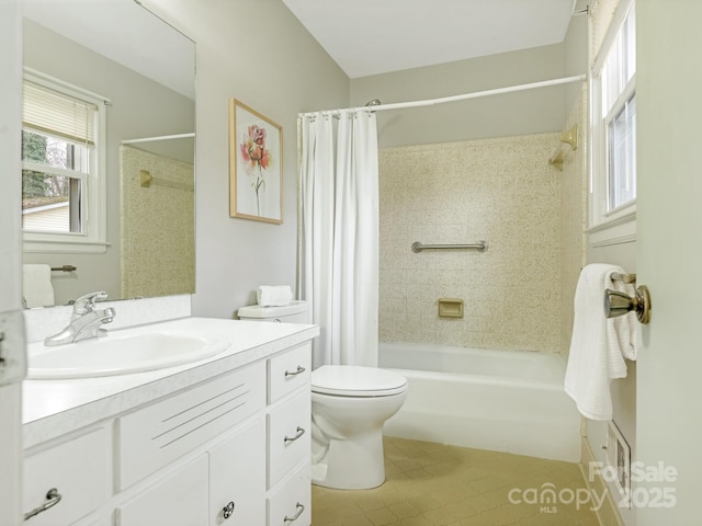 full bathroom with vanity, toilet, and shower / bath combo with shower curtain