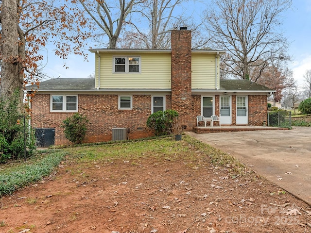 back of house featuring a patio and central AC