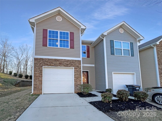 view of front of property with a garage