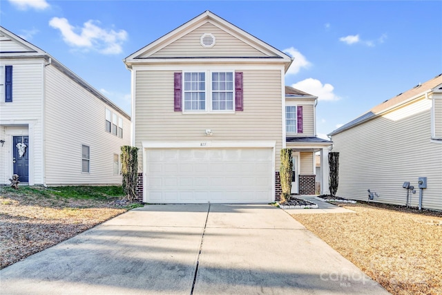 front of property with a garage