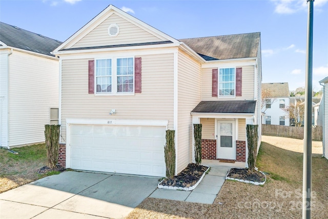 view of front of home with a garage