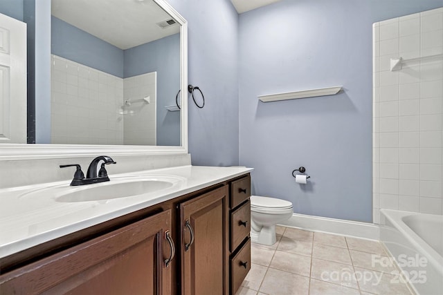 full bathroom with tile patterned floors, vanity, toilet, and tiled shower / bath