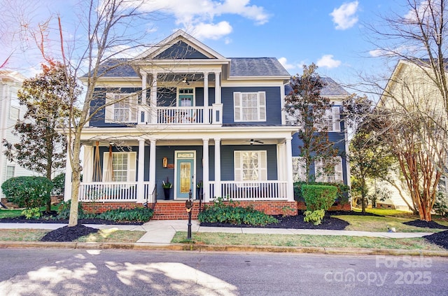 view of front of house with covered porch and a balcony