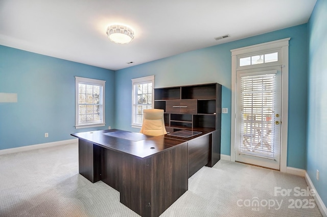 home office featuring light colored carpet