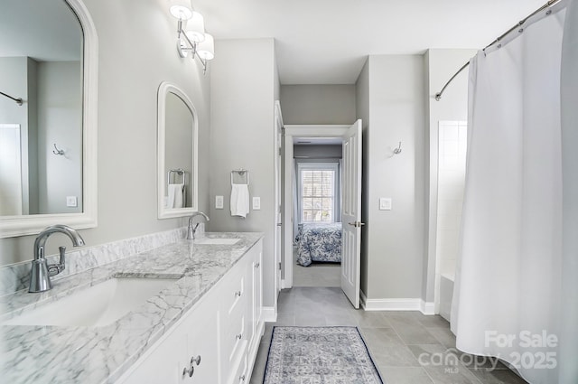 bathroom featuring shower / bath combination with curtain and vanity