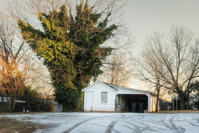 view of snow covered garage