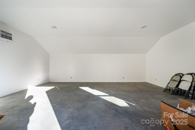 additional living space with lofted ceiling