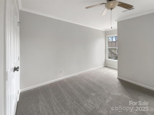 carpeted empty room with crown molding and ceiling fan