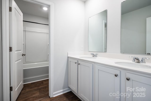 bathroom featuring hardwood / wood-style floors and vanity