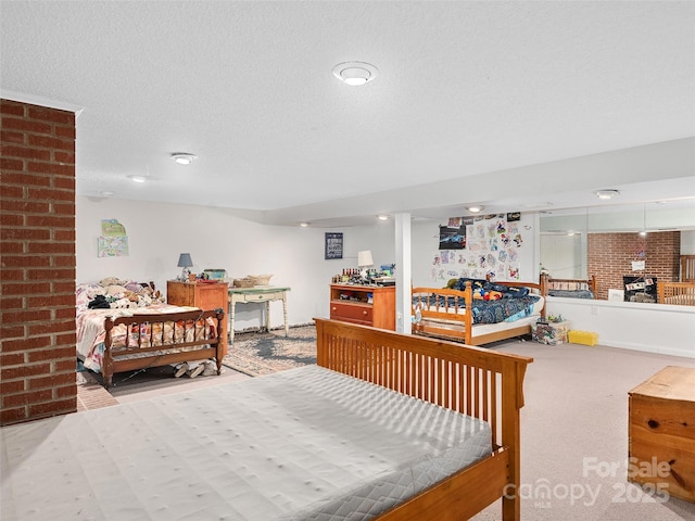 carpeted bedroom with a textured ceiling